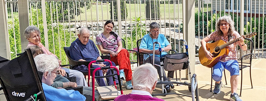 A sing-a-long on the patio at Pine Villa is the perfect summer activity!