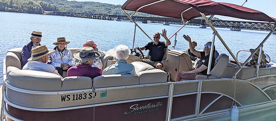 Pines residents go for a pontoon ride on Lake Wisconsin.