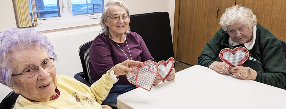 Pines ladies worked on Valentines decorations.